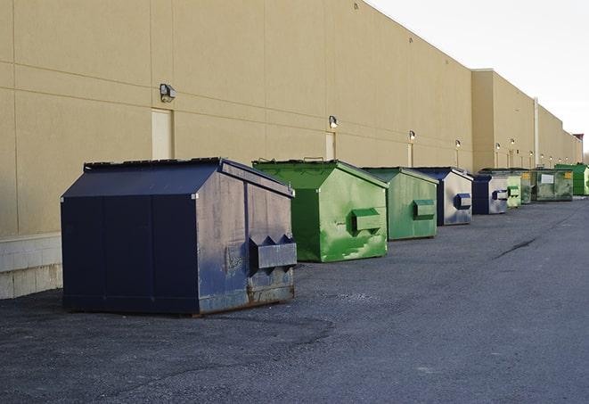 several large trash cans setup for proper construction site cleanup in Alsip